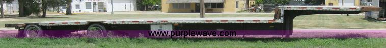 image for item 6874 2000 Wabash 52' spread axle flatbed trailer