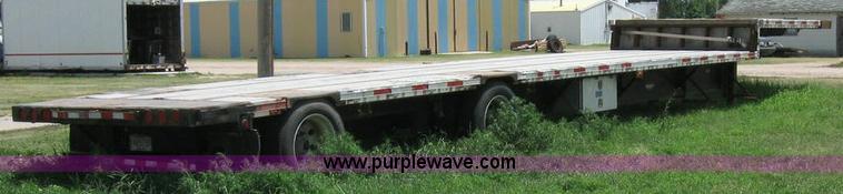 image for item 6874 2000 Wabash 52' spread axle flatbed trailer