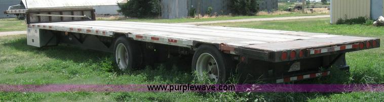 image for item 6874 2000 Wabash 52' spread axle flatbed trailer
