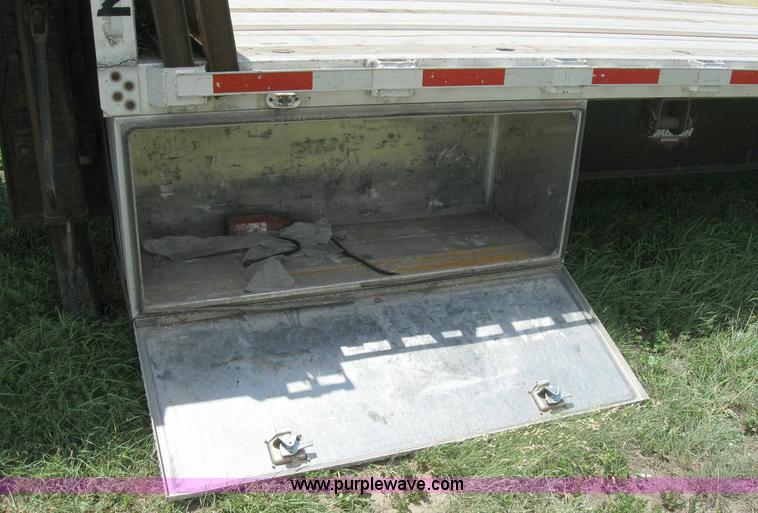 image for item 6874 2000 Wabash 52' spread axle flatbed trailer