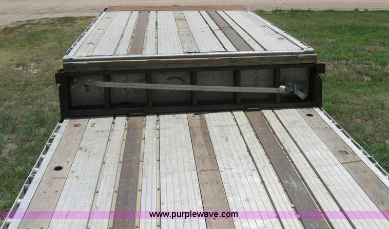 image for item 6874 2000 Wabash 52' spread axle flatbed trailer