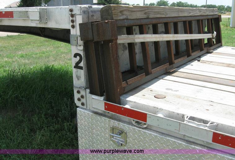 image for item 6874 2000 Wabash 52' spread axle flatbed trailer