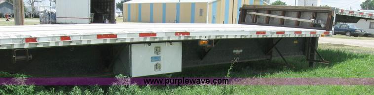 image for item 6874 2000 Wabash 52' spread axle flatbed trailer