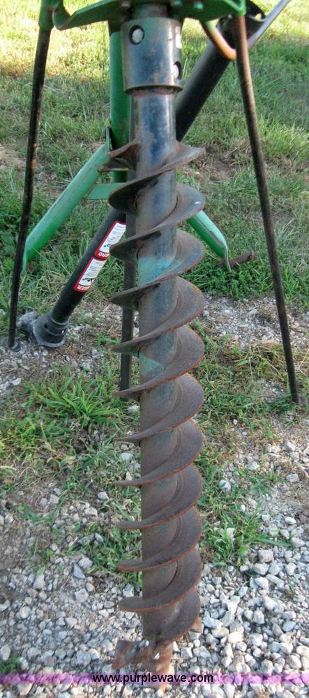 image for item 7229 John Deere post hole digger
