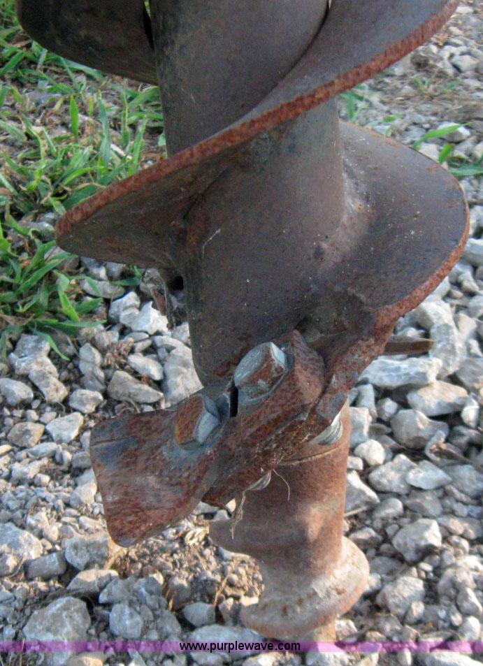 image for item 7229 John Deere post hole digger