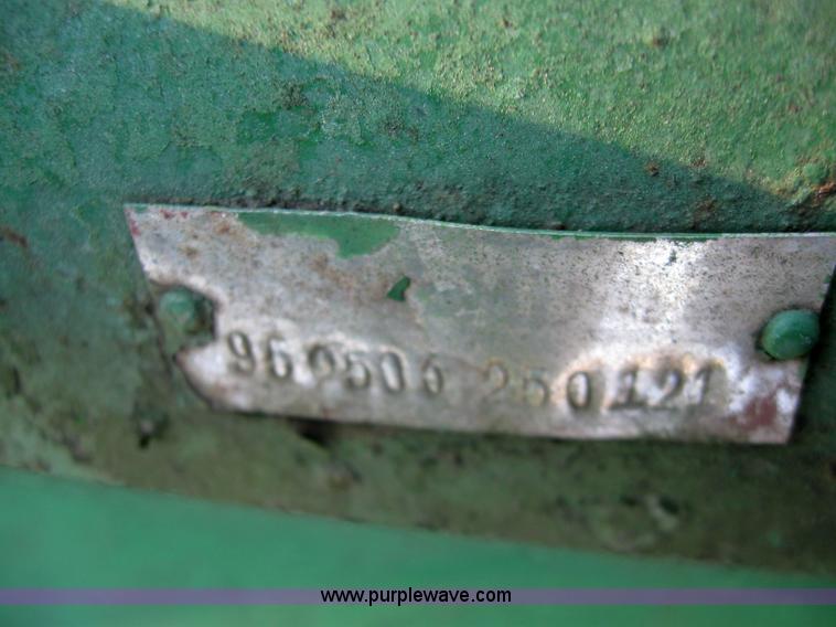 image for item 7229 John Deere post hole digger