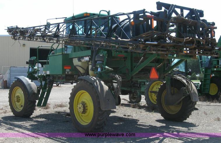 image for item 6889 1999 John Deere 4700 self propelled sprayer
