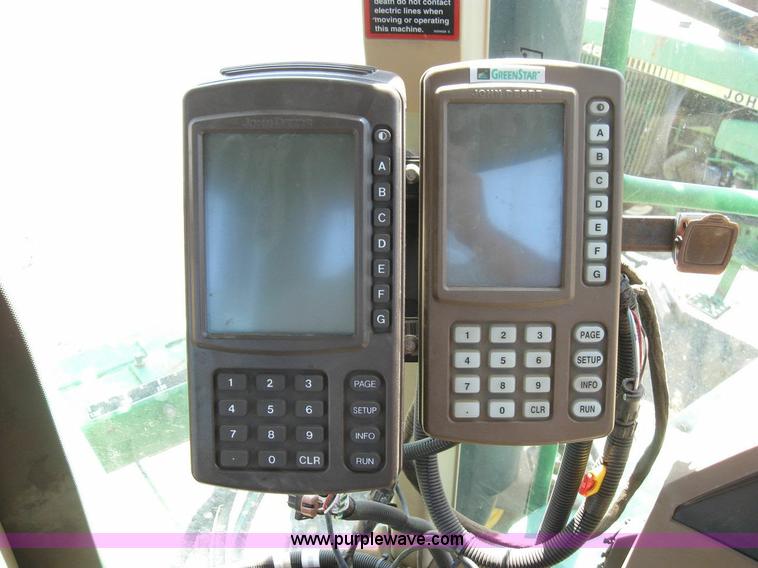 image for item 6889 1999 John Deere 4700 self propelled sprayer