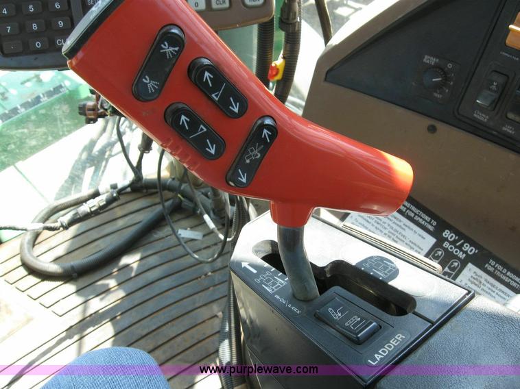 image for item 6889 1999 John Deere 4700 self propelled sprayer