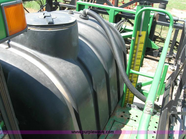 image for item 6889 1999 John Deere 4700 self propelled sprayer