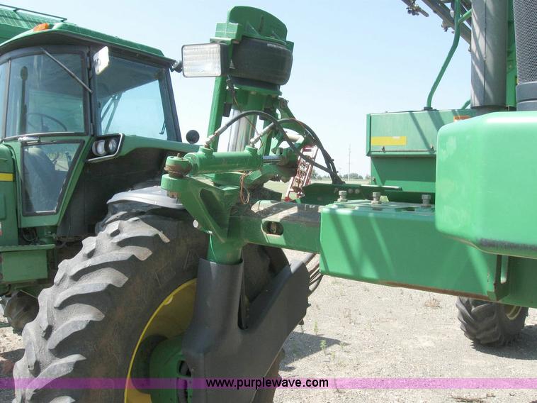 image for item 6889 1999 John Deere 4700 self propelled sprayer