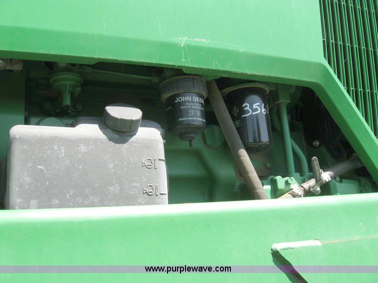 image for item 6889 1999 John Deere 4700 self propelled sprayer