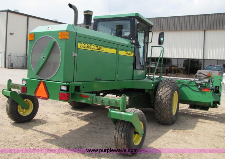 image for item 6900 2003 John Deere 4895 windrower with Power Reverser 895 18' head