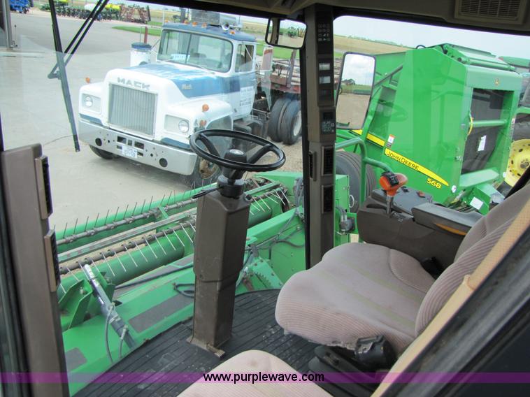 image for item 6900 2003 John Deere 4895 windrower with Power Reverser 895 18' head