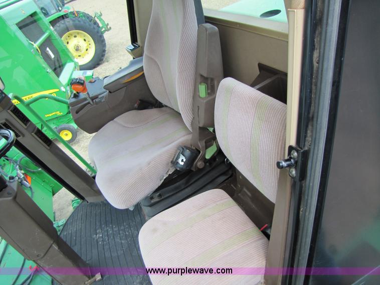 image for item 6900 2003 John Deere 4895 windrower with Power Reverser 895 18' head