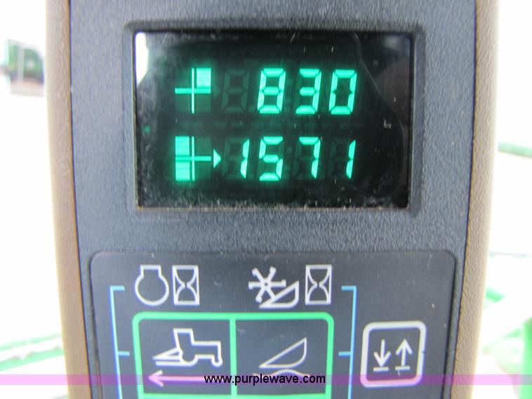 image for item 6900 2003 John Deere 4895 windrower with Power Reverser 895 18' head