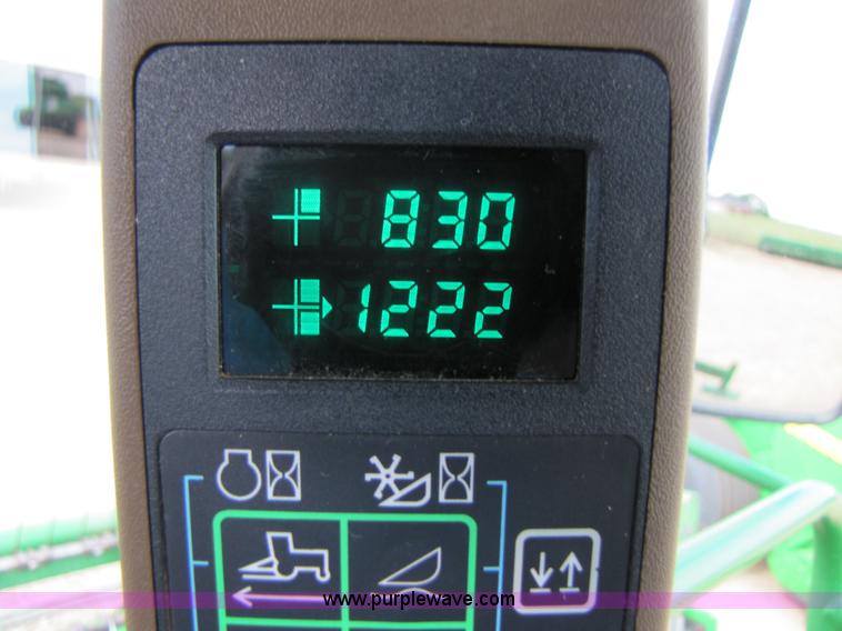 image for item 6900 2003 John Deere 4895 windrower with Power Reverser 895 18' head