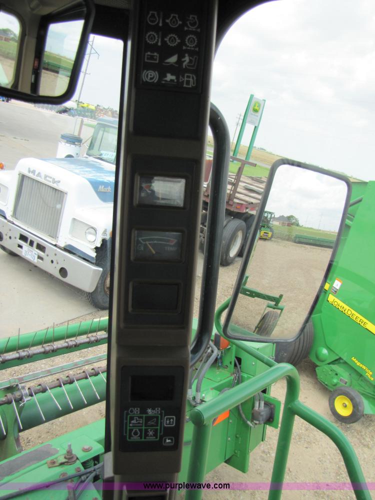 image for item 6900 2003 John Deere 4895 windrower with Power Reverser 895 18' head