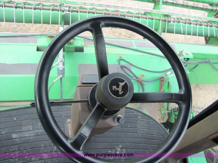 image for item 6900 2003 John Deere 4895 windrower with Power Reverser 895 18' head
