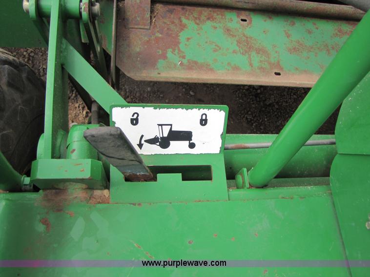 image for item 6900 2003 John Deere 4895 windrower with Power Reverser 895 18' head
