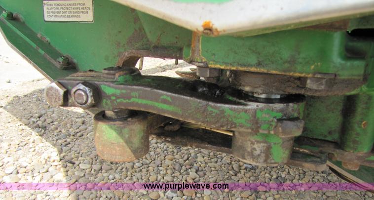 image for item 6900 2003 John Deere 4895 windrower with Power Reverser 895 18' head