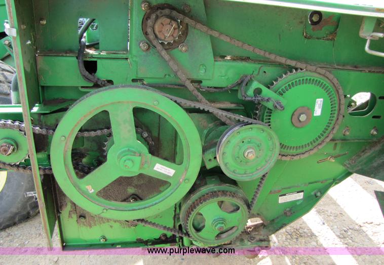image for item 6900 2003 John Deere 4895 windrower with Power Reverser 895 18' head