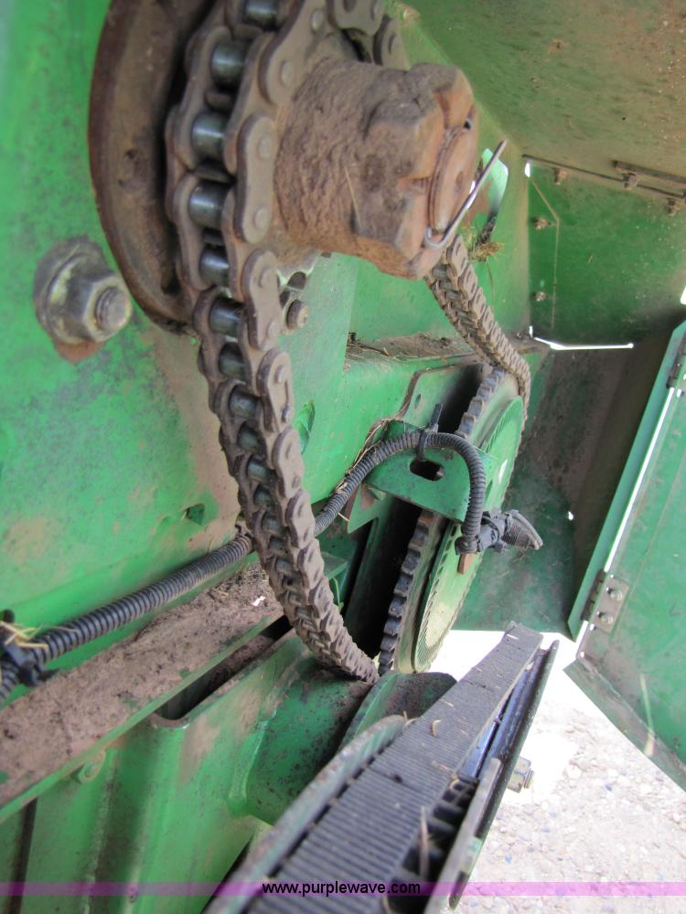 image for item 6900 2003 John Deere 4895 windrower with Power Reverser 895 18' head