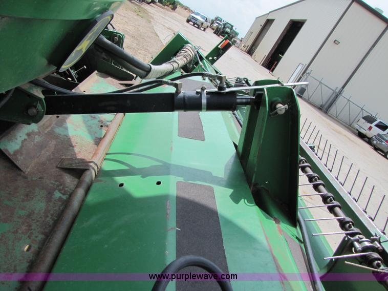 image for item 6900 2003 John Deere 4895 windrower with Power Reverser 895 18' head
