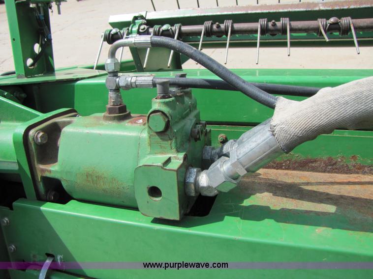 image for item 6900 2003 John Deere 4895 windrower with Power Reverser 895 18' head