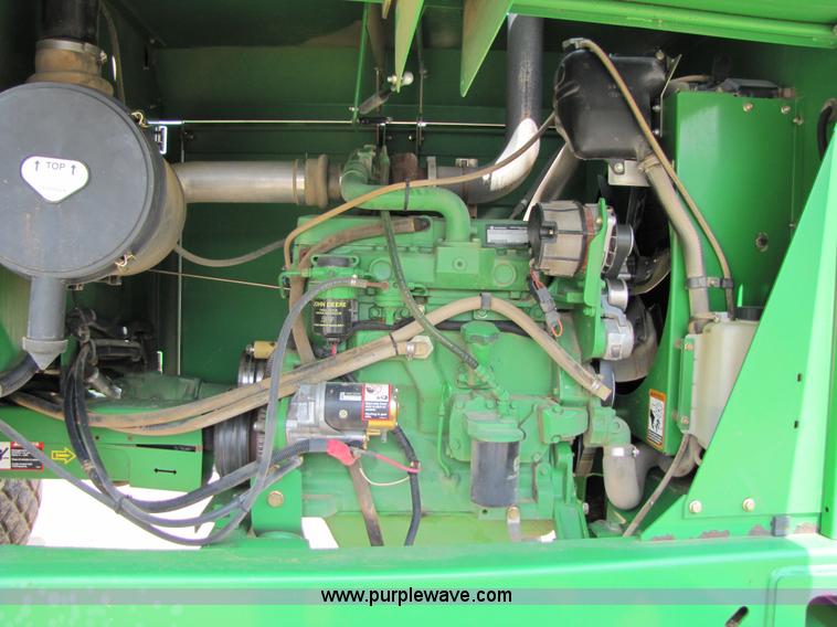 image for item 6900 2003 John Deere 4895 windrower with Power Reverser 895 18' head
