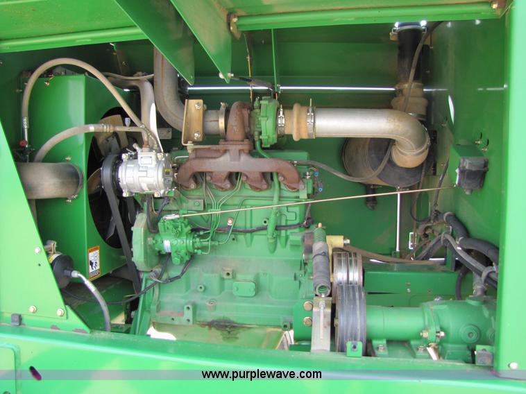 image for item 6900 2003 John Deere 4895 windrower with Power Reverser 895 18' head