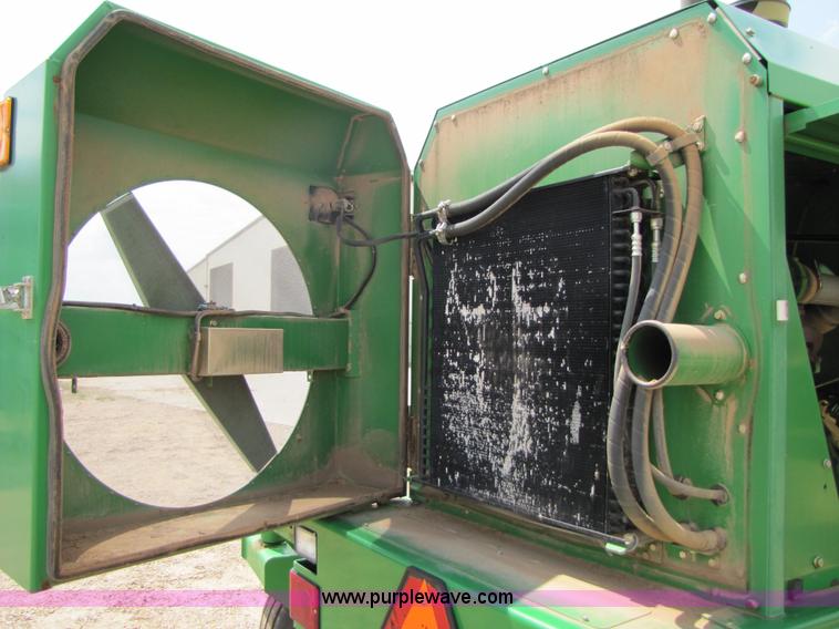 image for item 6900 2003 John Deere 4895 windrower with Power Reverser 895 18' head