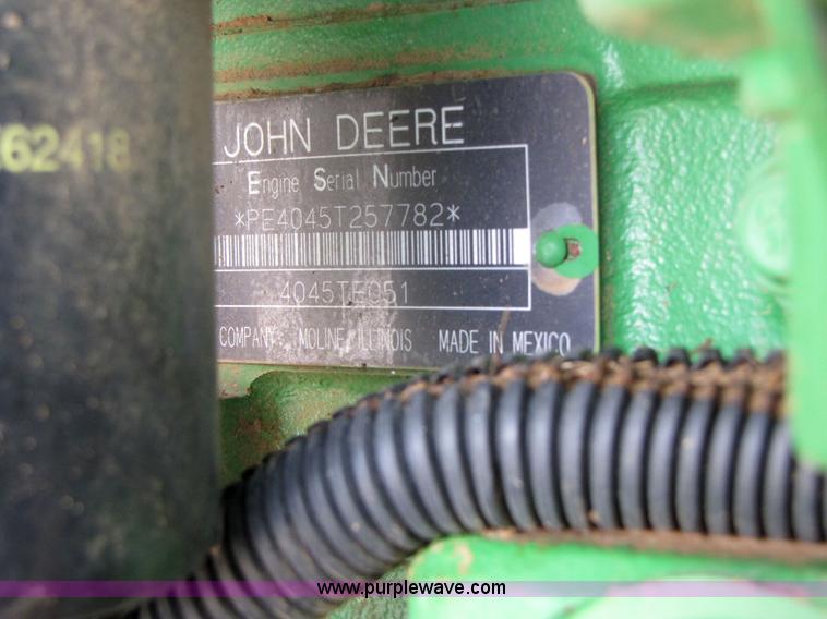 image for item 6900 2003 John Deere 4895 windrower with Power Reverser 895 18' head