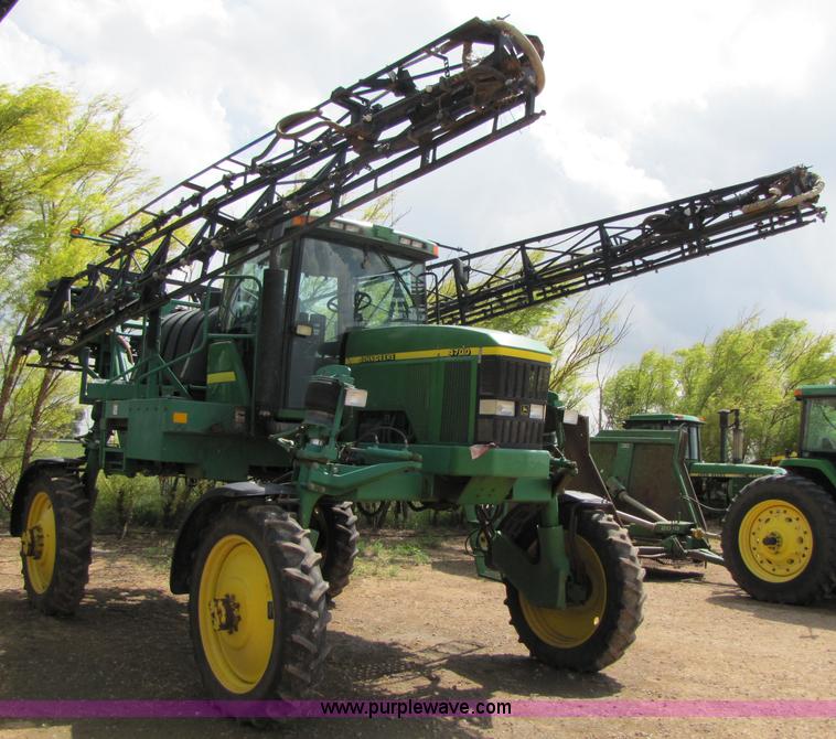 image for item 6908 1998 John Deere 4700 sprayer with 90' boom
