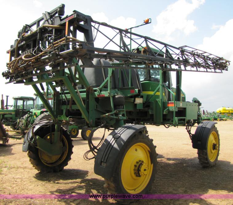image for item 6908 1998 John Deere 4700 sprayer with 90' boom