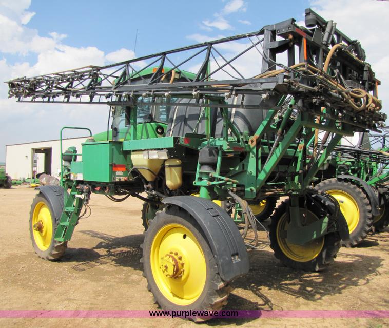 image for item 6908 1998 John Deere 4700 sprayer with 90' boom