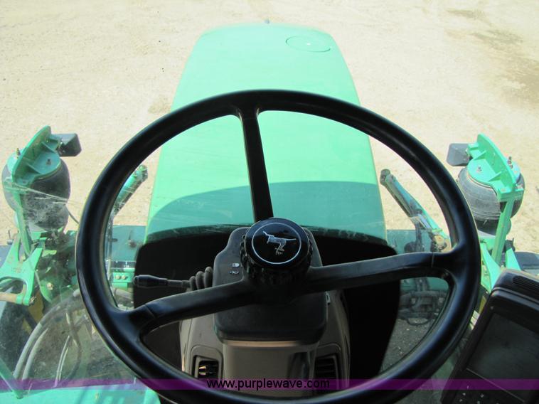 image for item 6908 1998 John Deere 4700 sprayer with 90' boom