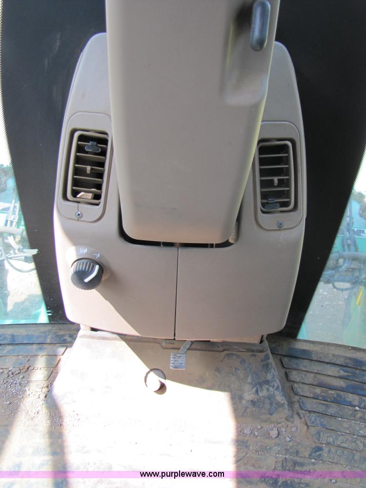 image for item 6908 1998 John Deere 4700 sprayer with 90' boom