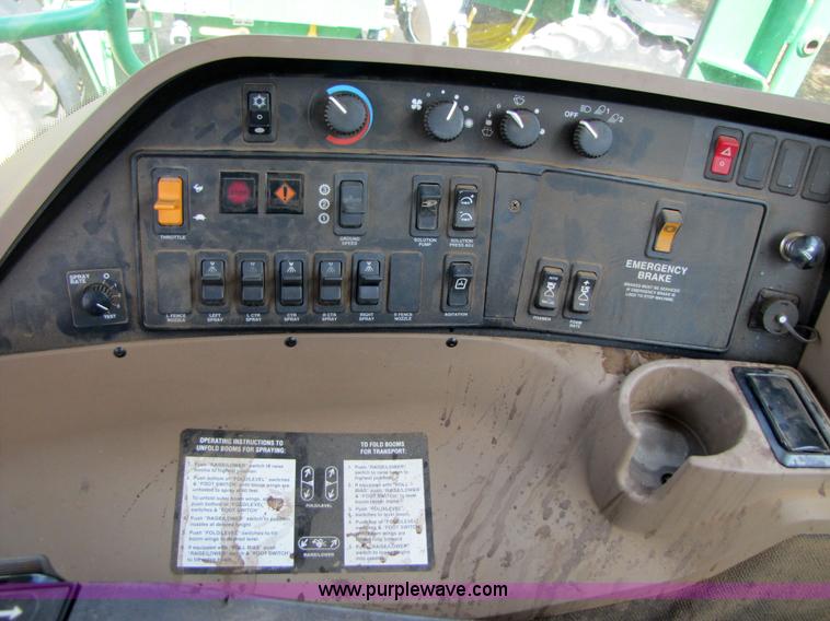 image for item 6908 1998 John Deere 4700 sprayer with 90' boom