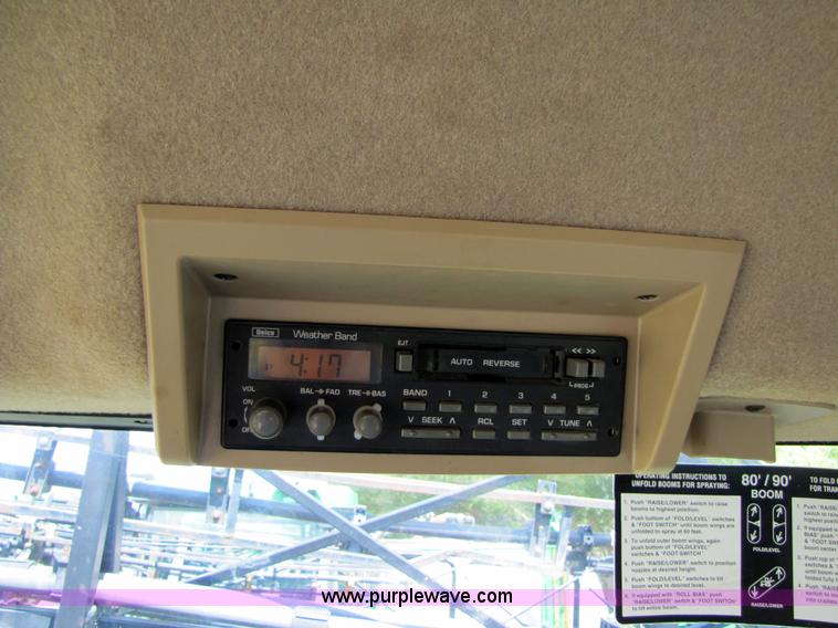 image for item 6908 1998 John Deere 4700 sprayer with 90' boom