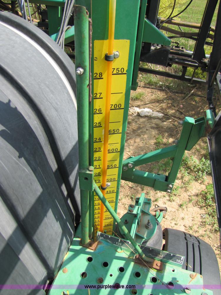 image for item 6908 1998 John Deere 4700 sprayer with 90' boom