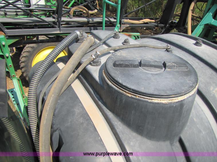 image for item 6908 1998 John Deere 4700 sprayer with 90' boom