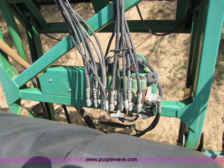 image for item 6908 1998 John Deere 4700 sprayer with 90' boom