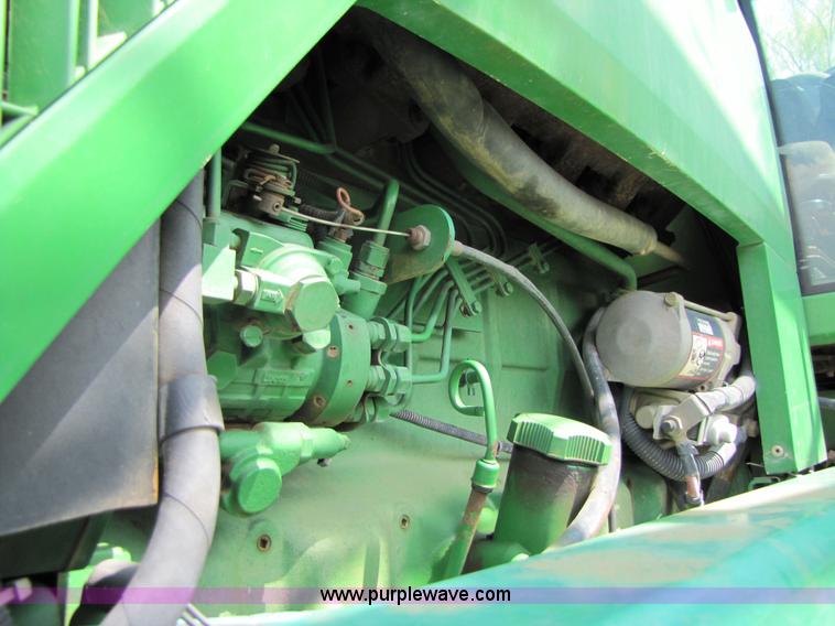 image for item 6908 1998 John Deere 4700 sprayer with 90' boom