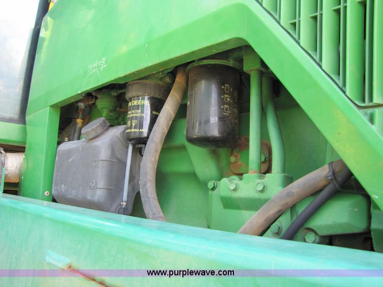 image for item 6908 1998 John Deere 4700 sprayer with 90' boom