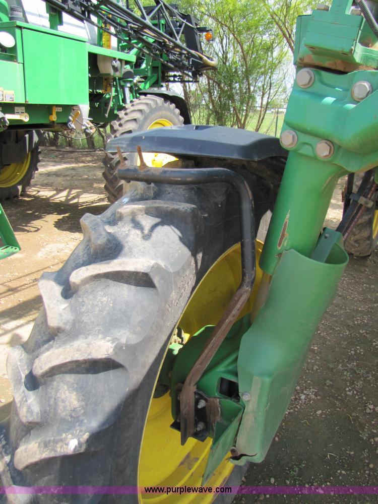 image for item 6908 1998 John Deere 4700 sprayer with 90' boom