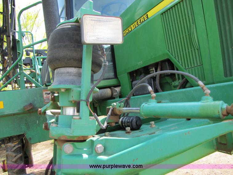 image for item 6908 1998 John Deere 4700 sprayer with 90' boom
