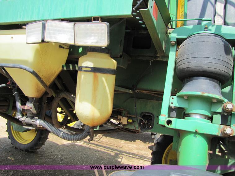 image for item 6908 1998 John Deere 4700 sprayer with 90' boom