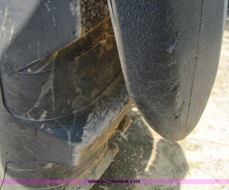 image for item 6908 1998 John Deere 4700 sprayer with 90' boom