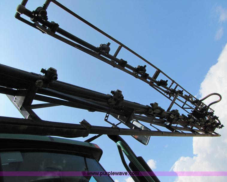 image for item 6908 1998 John Deere 4700 sprayer with 90' boom